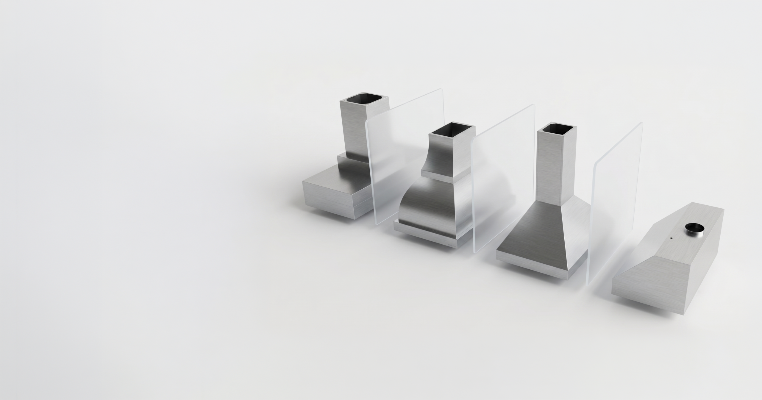 Stainless steel Vent-A-Hood range hoods with frosted glass panels in a modern kitchen display.